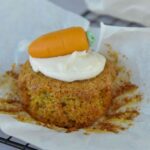 Swiss Carrot Cupcake with frosting and marzipan carrot