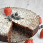 Torta Caprese - flourless Chocolate Cake, slice missing