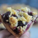 Cherry Crumble Bars in hand