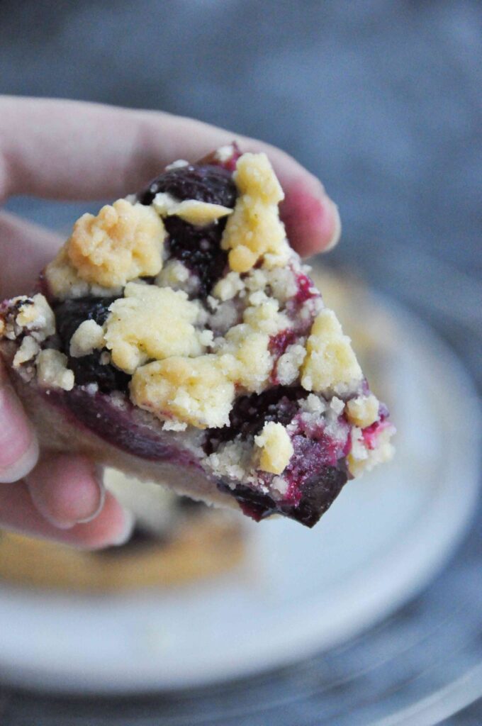 Cherry Crumble Bars in hand