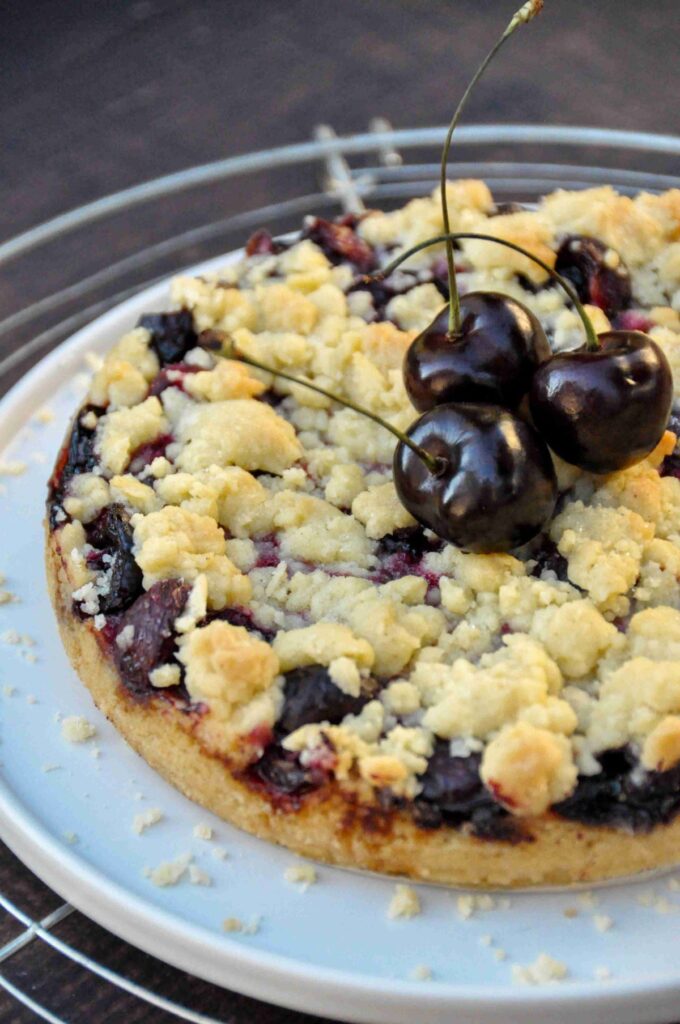 Cherry Crumble Bars on cooling rack