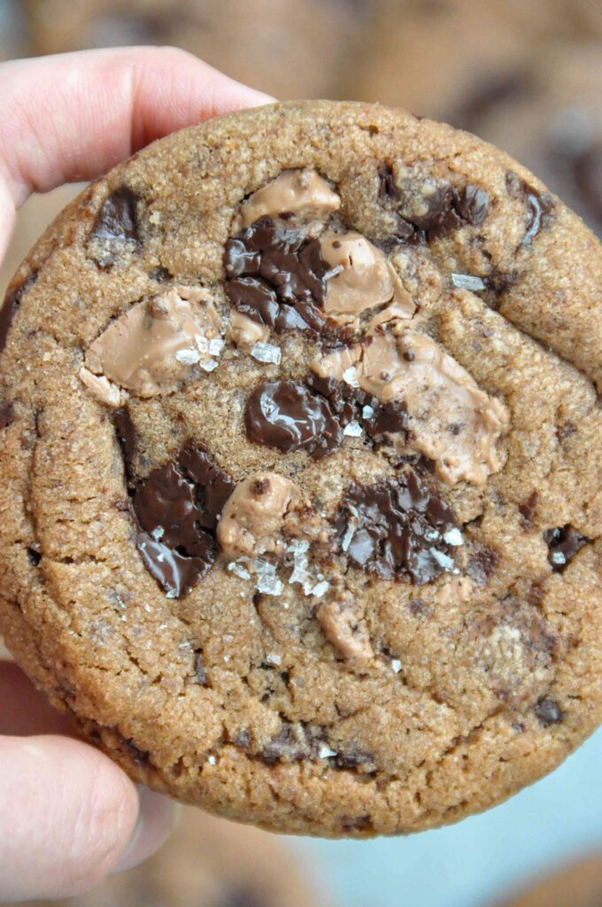Crunchy Chunky Chocolate Cookies, closeup in hand