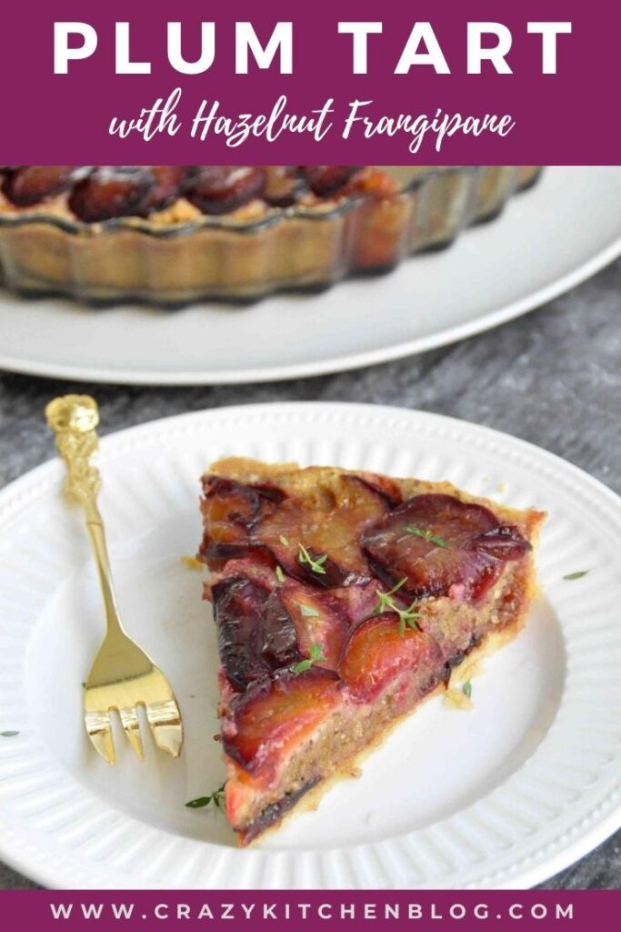 Plum Hazelnut Frangipane Tart slice on a plate