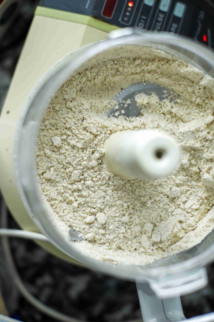 Grinding the flour and hazelnuts for Chocolate Hazelnut Tart