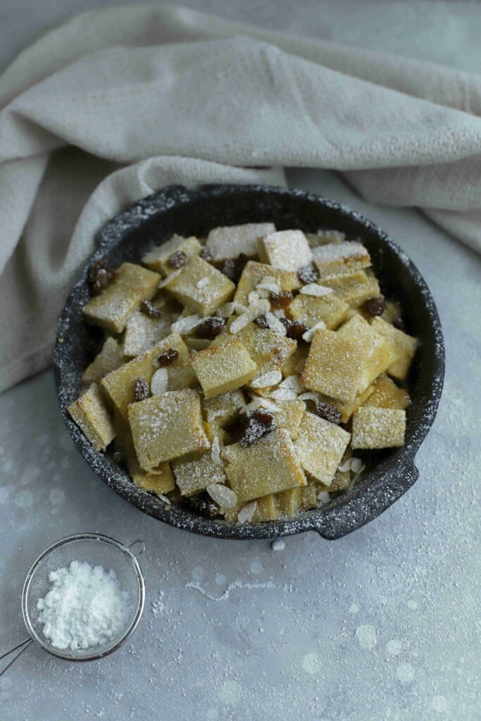 Königsschmarrn in a pan with powdered sugar